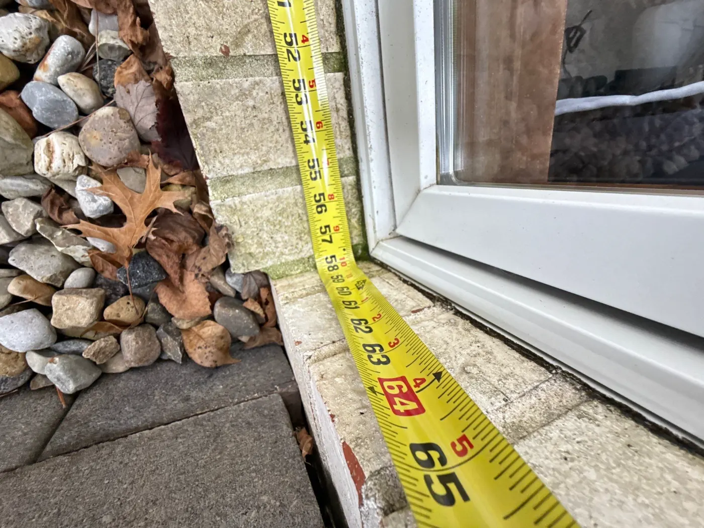 Storm-damaged window documented in Hazel Dell